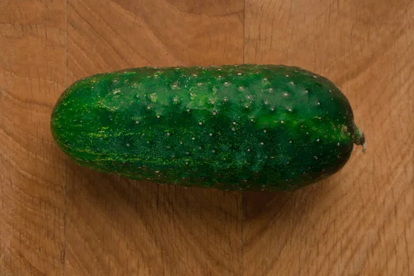 One Cucumber Wooden Board — Stock Photo, Image