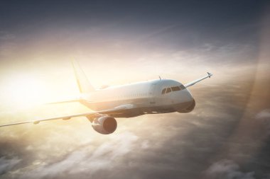 Flugzeug fliegt ber den Wolken
