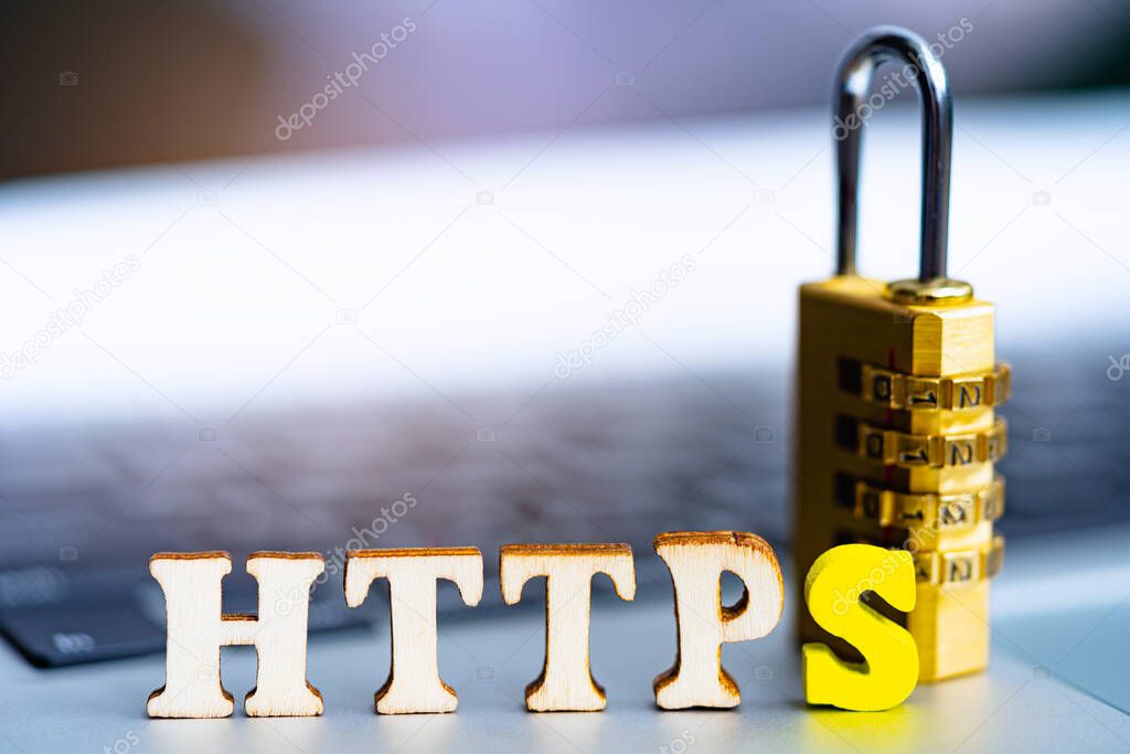 Word HTTPS on computer. Network security and data protection Cyber security concept.