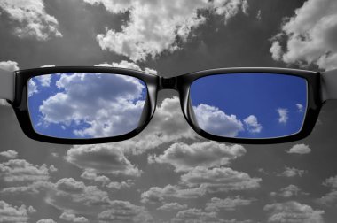 View through glasses of cloud in color clipart