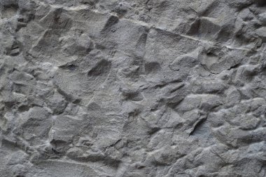 Çatlaklı pürüzlü dokulu taş yüzey, yakın çekim