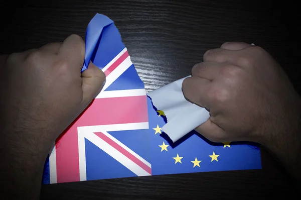 Hands Tearing Paper Flags Britain European Union — Stock Photo, Image