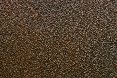 Kahverengi tonlarda dekoratif alçının pürüzlü dokusu.