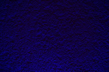 Mavi renklerde soyut desenli sıva arkaplanı.