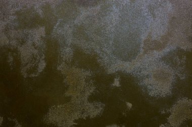 Bej tonlarda dekoratif alçının pürüzlü dokusu.