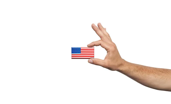 Hand Houdt Kleine Amerikaanse Vlag Witte Achtergrond — Stockfoto