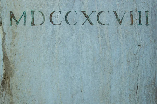 Παλαιοί Ρωμαϊκοί Αριθμοί Χαραγμένοι Μια Πέτρα Από Κοντά — Φωτογραφία Αρχείου