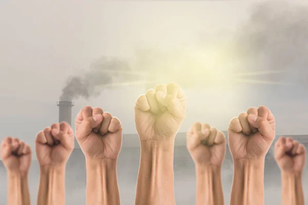 People Fists Raised Fighting Protest Smokestack Factory Black Smoke Sky — Stock Photo, Image