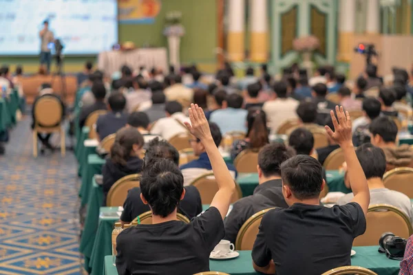 Rear View Audience Showing Hand Answer Question Speaker Stage Conference — Stock Photo, Image