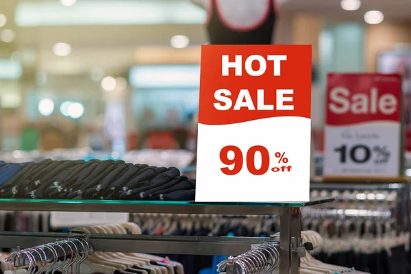 Hot sale 90% off mock up advertise display frame setting over the clothes line and swimming suit in the shopping department store for shopping, business fashion and advertisement concept