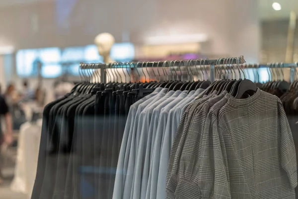 clothes line in glasses shop at shopping department store for shopping , business fashion and advertisement concept