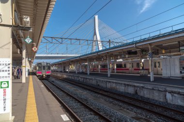 TOKYO, JAPAN - OCT, 2017 : JR Train coming to Aomori platform on October 26, 2017 at the Aomori station, Japan clipart