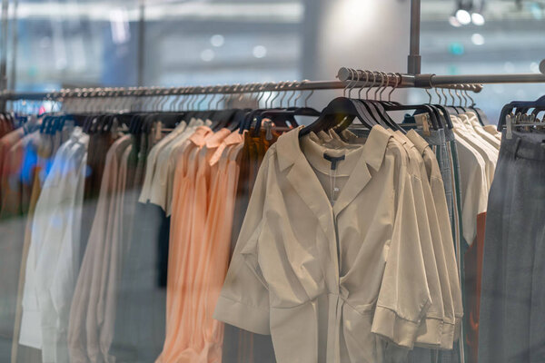 clothes line in glasses shop at shopping department store for shopping , business fashion and advertisement concept