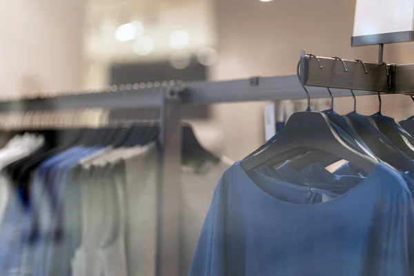 clothes line in glasses shop at shopping department store for shopping , business fashion and advertisement concept