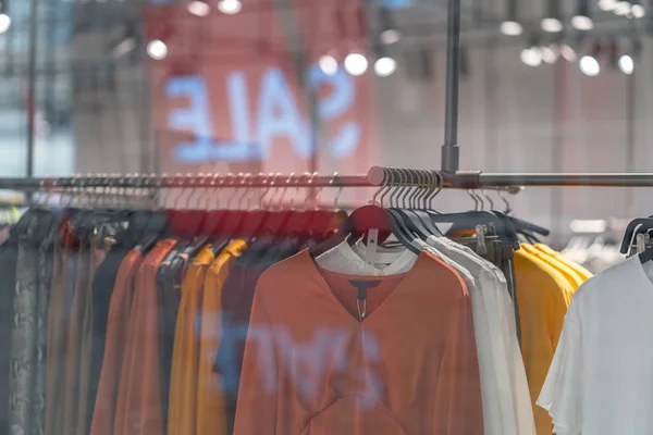 clothes line in glasses shop at shopping department store for shopping , business fashion and advertisement concept