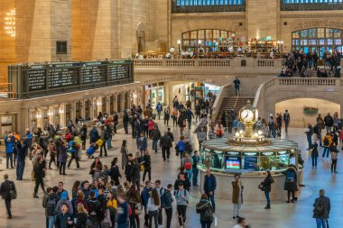 New York, USA - MAR 2019 : Undefined passenger and tourist visiting the Grand Central Station on March 29, 2019. Midtown Manhattan, New York City. United States, Business and Transportation concept clipart