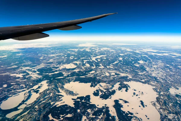 Out side above view from airplane side windows when sunrise, transportation and traveler concept