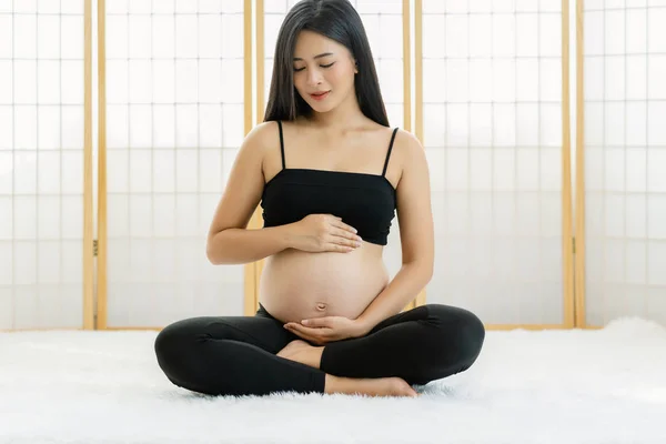 Asian Pregnant Sitting Holds Hands Belly Japanese Style House White — Stock Photo, Image