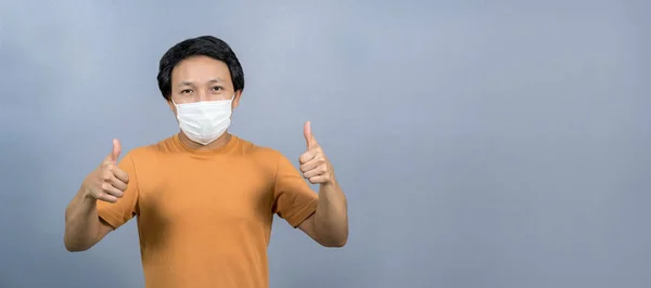 Portrait Asian Man Wearing Face Surgical Mask Thumbs Blue Color — Stock Photo, Image