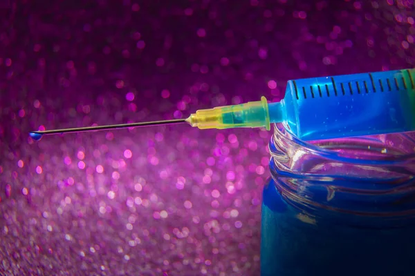 Closeup Photo Syringe Bottle Neck Blue Liquid Needle Blue Drop Стокове Фото