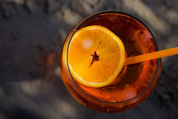 Orange drink at the beach.