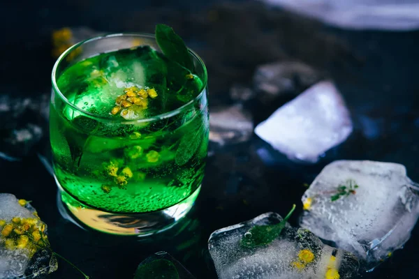 Green cocktail with mint, ice and soda. — Stock Photo, Image