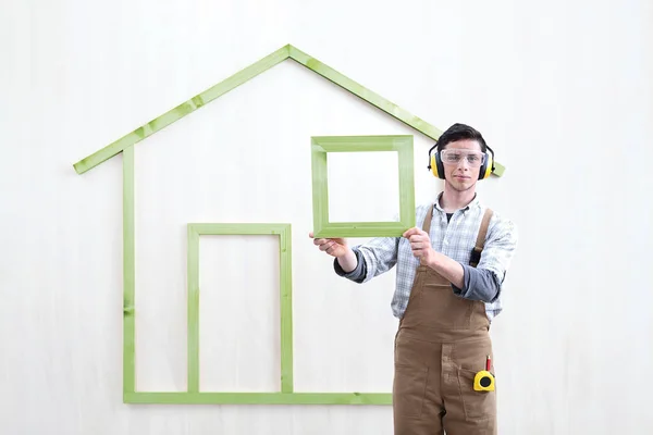 Hus konstruktion renovering koncept Handyman snickare arbetare — Stockfoto