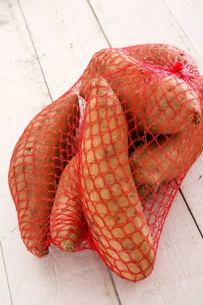 Sweet Potatoes Net Bag — Stock Photo, Image