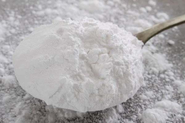 powdered confectioners sugar on the table
