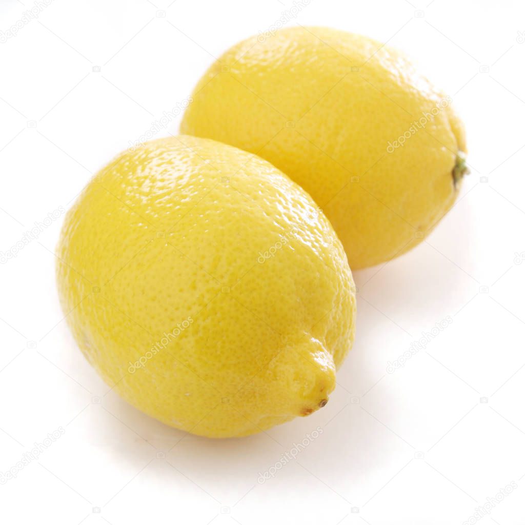 preparing fresh lemons on white background