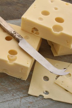 preparing dairy cheese portions clipart