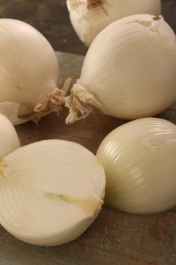 preparing raw onions close up clipart