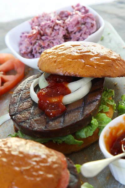 prepared vegan seitan burger meal