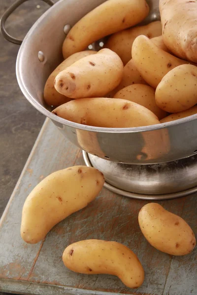 preparing fresh raw potatoes