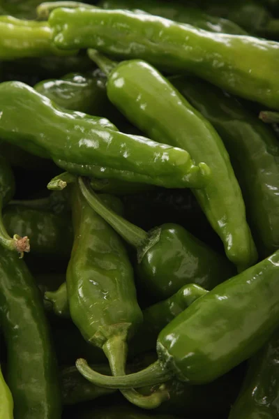 fresh green chillies on the table