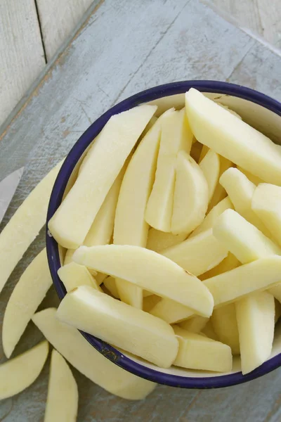 Uncooked Chipped Potatoes Table — Stock Photo, Image