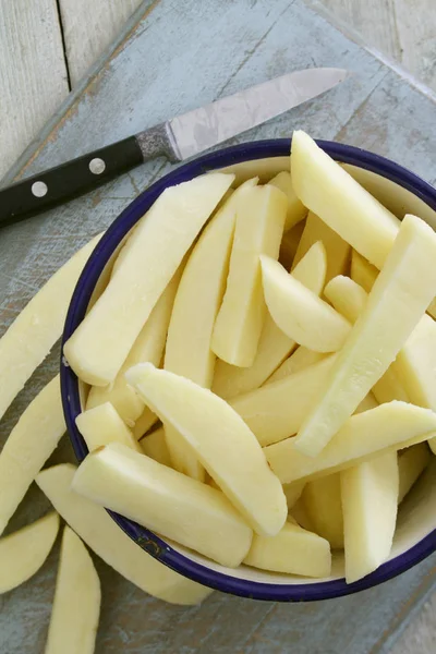 Uncooked Chipped Potatoes Table — Stock Photo, Image