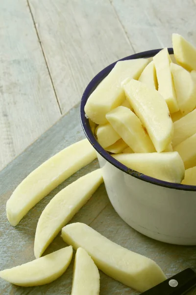 Uncooked Chipped Potatoes Table — Stock Photo, Image