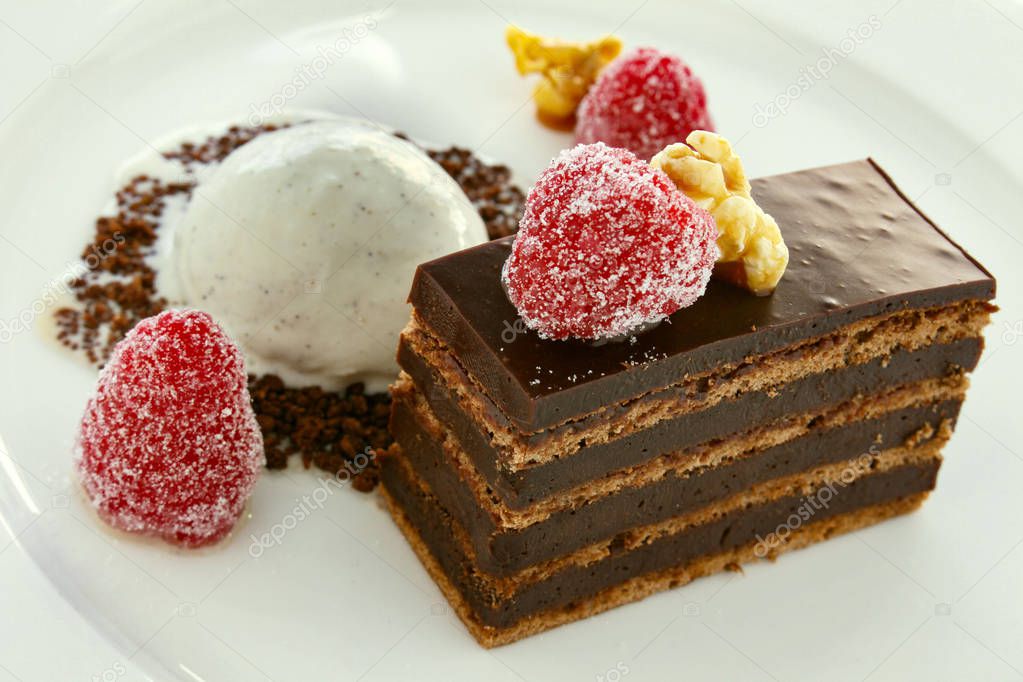 plated layered chocolate cake dessert