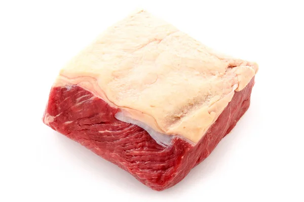 Beyaz Arka Plan Üzerinde Yaşlı Sığır Eti Biftek Kesmek — Stok fotoğraf
