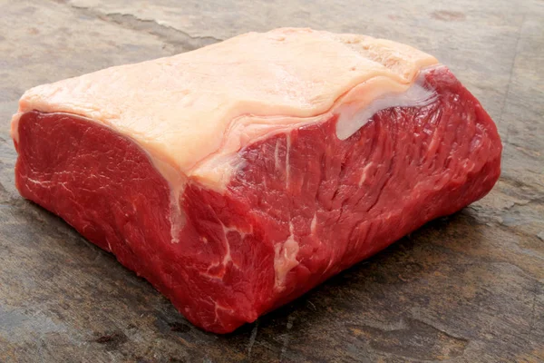 aged beef steak cut on the table