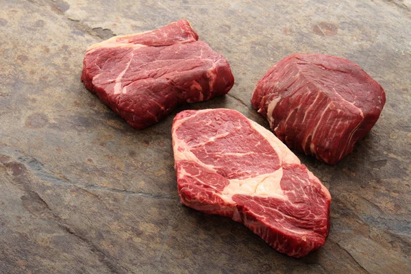 Aged Cut Beef Steaks Table — Stock Photo, Image