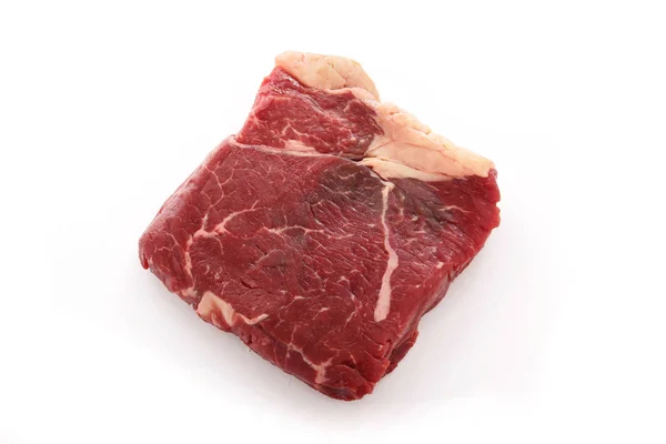 Beyaz Arka Plan Üzerinde Yaşlı Sığır Eti Biftek Kesmek — Stok fotoğraf