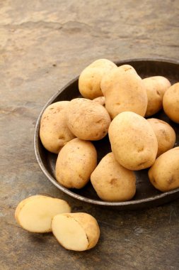preparing fresh raw potatoes clipart