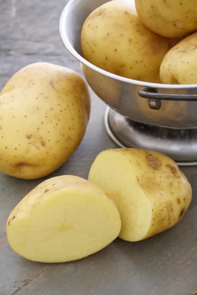 preparing fresh raw potatoes