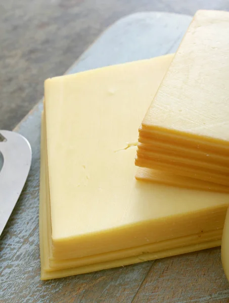 Sliced Tasty Cheese Portions — Stock Photo, Image