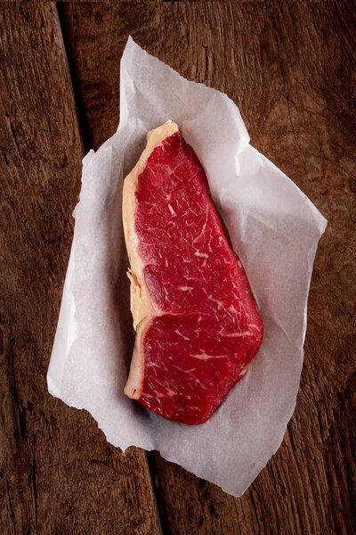 aged beef steak cut on the table