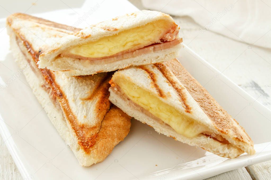 fresh toasted cheese and ham sandwich