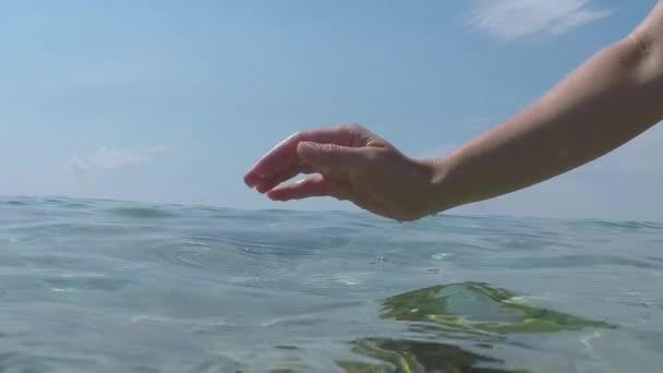 Slow Motion Close Half Underwater Caucasian Female Hand Playing Water — Stock Video