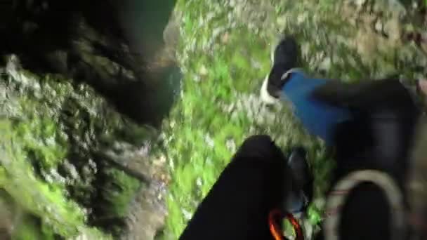 Pov Unrecognizable Climber Climbing Mossy Dangerous Mountain Cliff Jumping Ledge — Stock Video